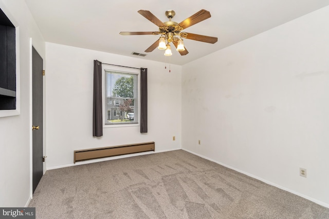 3135 Sollers Point Rd, Baltimore, MD 21222 - empty room featuring baseboard heating, carpet, ceiling fan, and baseboards