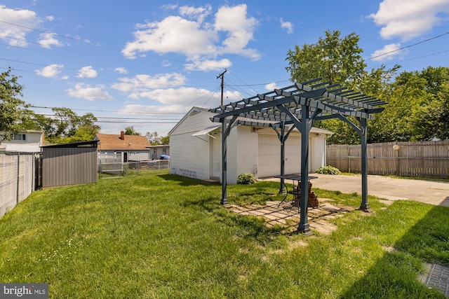 3135 Sollers Point Rd, Baltimore, MD 21222 - view of yard with an outdoor structure, a pergola, driveway, and a garage