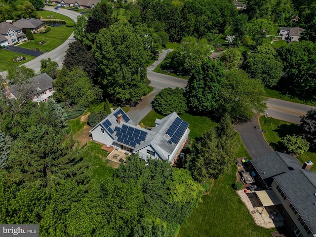 aerial view of property's location featuring nearby suburban area