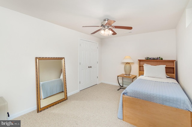 bedroom with carpet, baseboards, and ceiling fan