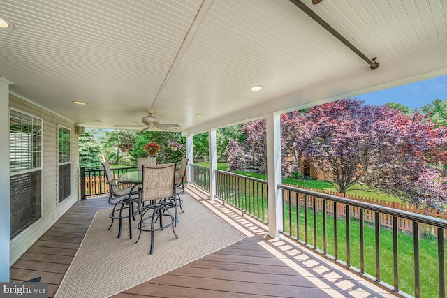 43413 Countrywalk Ct, Ashburn, VA 20147 - deck with ceiling fan, outdoor dining area, and a yard