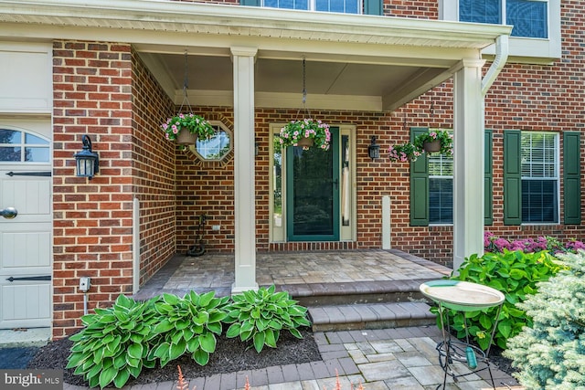 43413 Countrywalk Ct, Ashburn, VA 20147 - entrance to property with brick siding and a porch