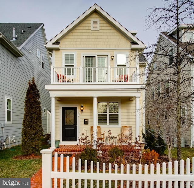 816 Bay Ridge Ave, Annapolis, MD 21403 - view of front of home featuring a balcony, a porch, and a fenced front yard