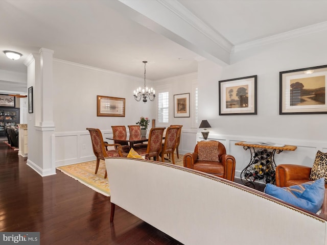 816 Bay Ridge Ave, Annapolis, MD 21403 - dining room with crown molding, dark wood-type flooring, a decorative wall, decorative columns, and wainscoting