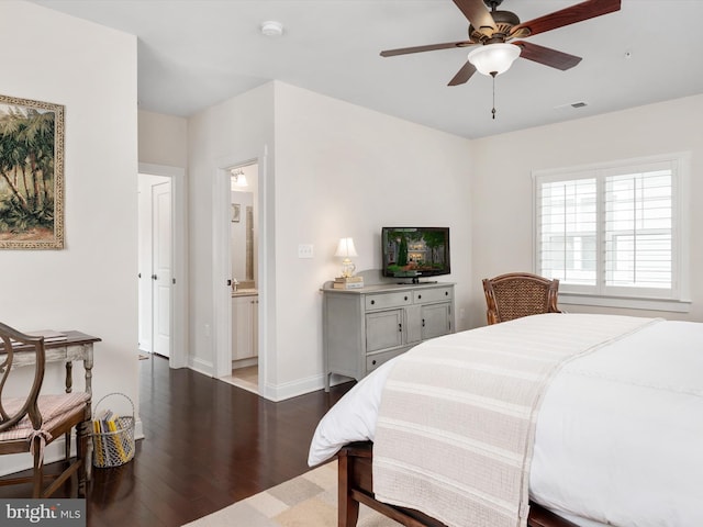 816 Bay Ridge Ave, Annapolis, MD 21403 - bedroom with wood finished floors, baseboards, connected bathroom, and ceiling fan