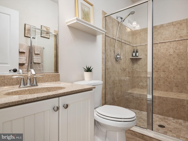 816 Bay Ridge Ave, Annapolis, MD 21403 - bathroom featuring a stall shower, toilet, and vanity