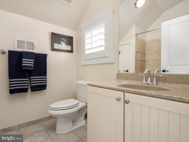 816 Bay Ridge Ave, Annapolis, MD 21403 - full bath featuring vaulted ceiling, toilet, tile patterned floors, vanity, and baseboards
