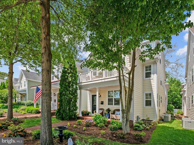 816 Bay Ridge Ave, Annapolis, MD 21403 - view of front of property with central AC unit, a porch, a balcony, and a front yard