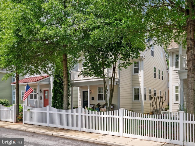 816 Bay Ridge Ave, Annapolis, MD 21403 - view of front of house featuring a fenced front yard and a balcony