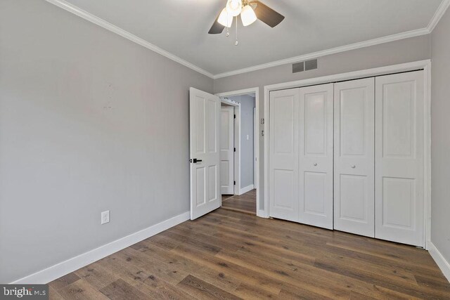 1604 Old New Windsor Rd, New Windsor, MD 21776 - unfurnished bedroom featuring ornamental molding, baseboards, wood finished floors, a closet, and ceiling fan