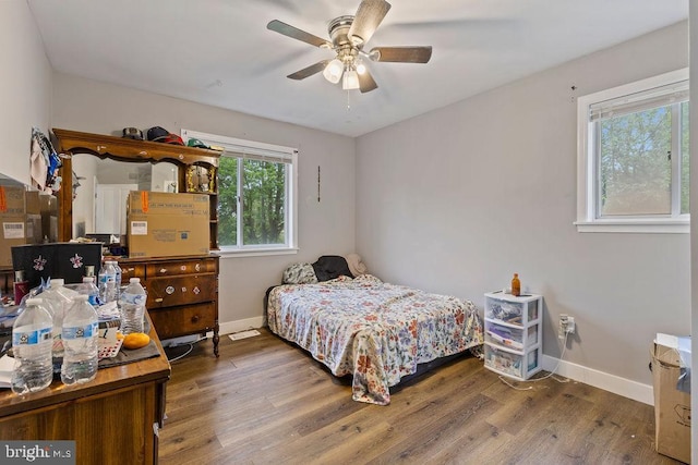 1604 Old New Windsor Rd, New Windsor, MD 21776 - bedroom with baseboards, wood finished floors, and ceiling fan