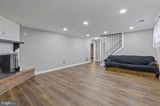 1604 Old New Windsor Rd, New Windsor, MD 21776 - living room featuring wood finished floors, recessed lighting, a fireplace, baseboards, and stairs