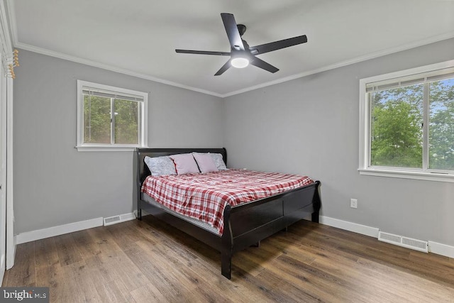 1604 Old New Windsor Rd, New Windsor, MD 21776 - bedroom with baseboards, wood finished floors, crown molding, and ceiling fan