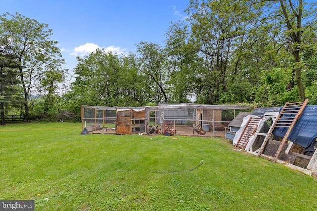 1604 Old New Windsor Rd, New Windsor, MD 21776 - view of green lawn with exterior structure and an outbuilding