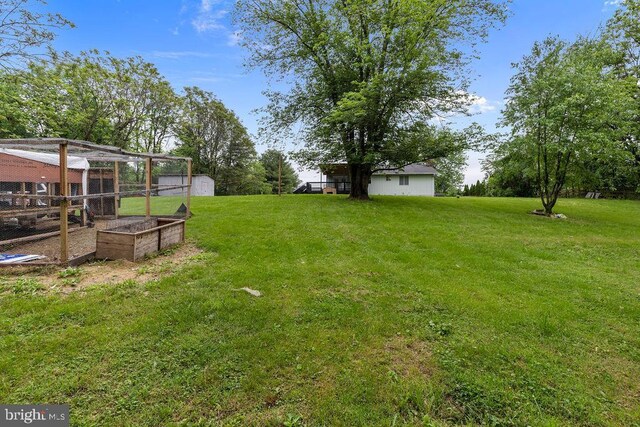1604 Old New Windsor Rd, New Windsor, MD 21776 - view of green lawn featuring an outdoor structure and exterior structure