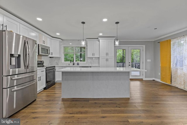 1604 Old New Windsor Rd, New Windsor, MD 21776 - kitchen featuring appliances with stainless steel finishes, a sink, plenty of natural light, french doors, and crown molding