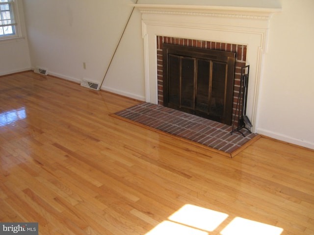 337 Carrsbrook Dr, Charlottesville, VA 22901 - detailed view of wood finished floors, a fireplace, and baseboards
