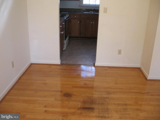337 Carrsbrook Dr, Charlottesville, VA 22901 - corridor featuring a sink, light wood-style flooring, and baseboards