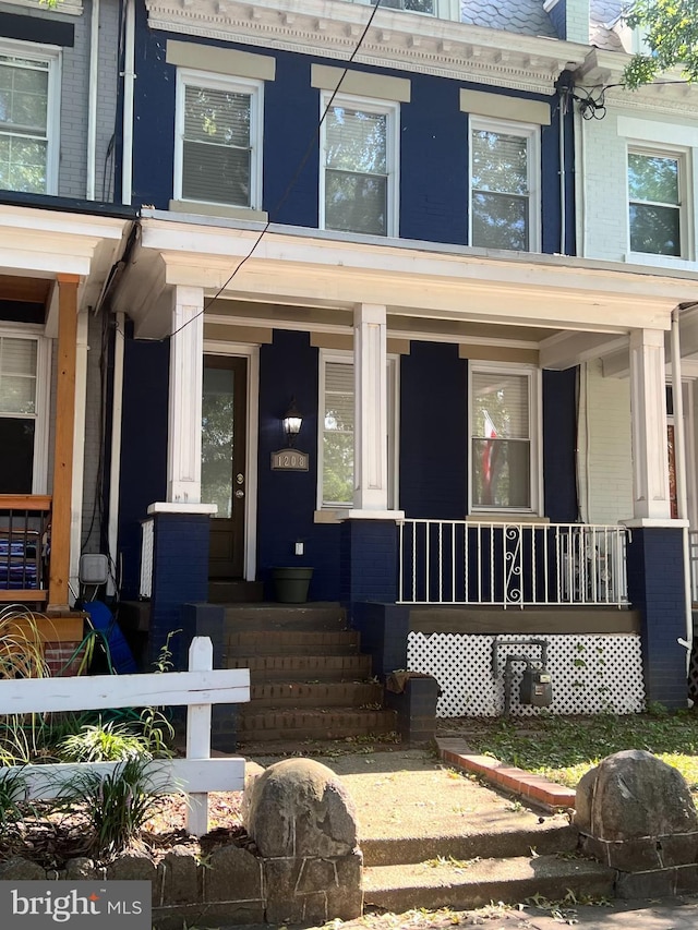 1208 Shepherd St NW, Washington, DC 20011 - view of front of property featuring covered porch and brick siding