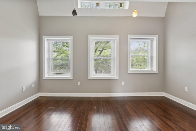 1208 Shepherd St NW, Washington, DC 20011 - spare room featuring dark wood-style floors, plenty of natural light, and baseboards