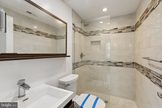 1208 Shepherd St NW, Washington, DC 20011 - full bathroom featuring toilet, a tile shower, recessed lighting, and vanity