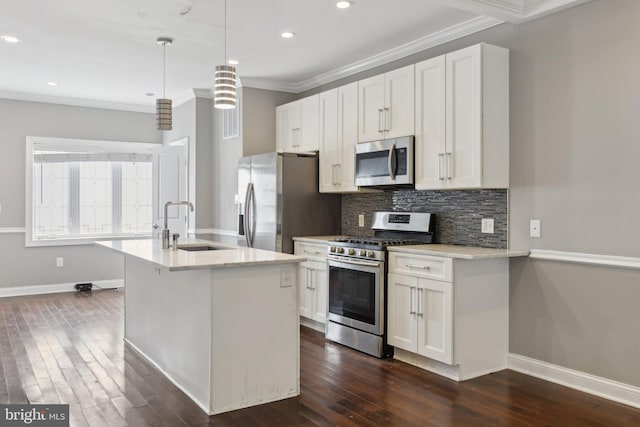1208 Shepherd St NW, Washington, DC 20011 - kitchen with stainless steel appliances, a sink, tasteful backsplash, crown molding, and white cabinetry