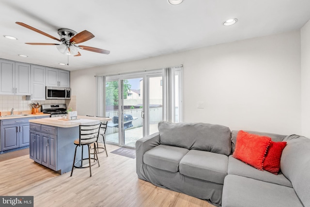 384 Bolton Rd, East Windsor, NJ 08520 - living room featuring a ceiling fan, recessed lighting, and light wood-style floors