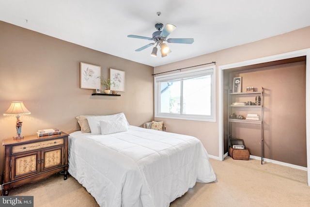 384 Bolton Rd, East Windsor, NJ 08520 - bedroom with light carpet, baseboards, and a ceiling fan