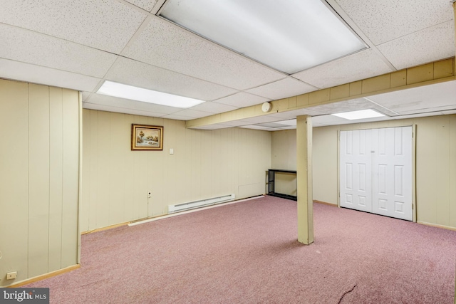 384 Bolton Rd, East Windsor, NJ 08520 - finished basement with baseboard heating, a drop ceiling, carpet, and baseboards