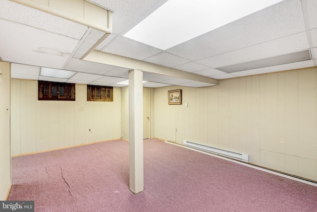 384 Bolton Rd, East Windsor, NJ 08520 - finished basement featuring a baseboard heating unit, carpet floors, and a drop ceiling