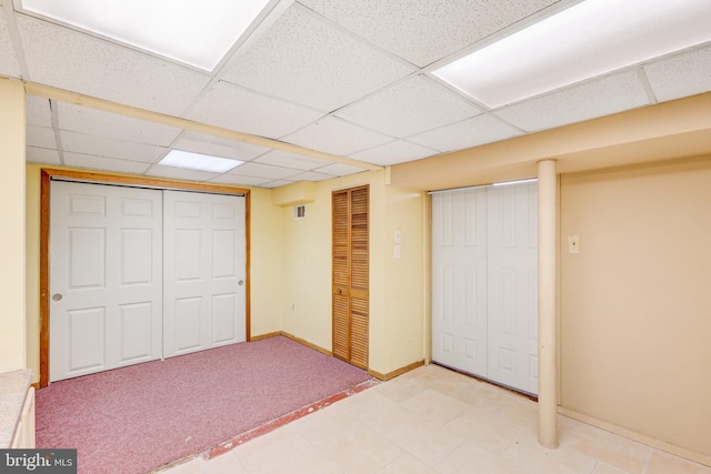 384 Bolton Rd, East Windsor, NJ 08520 - unfurnished bedroom with a paneled ceiling, baseboards, light colored carpet, and a closet