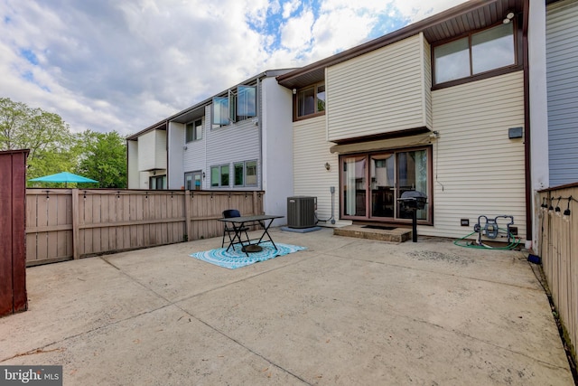 384 Bolton Rd, East Windsor, NJ 08520 - rear view of property with a patio area, central AC unit, and fence