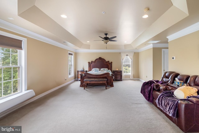 bedroom featuring a raised ceiling, light carpet, baseboards, ornamental molding, and recessed lighting
