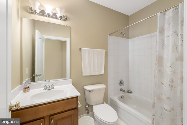 bathroom with shower / bath combo, toilet, and vanity