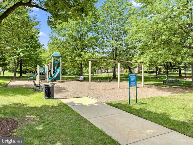 community play area with a lawn