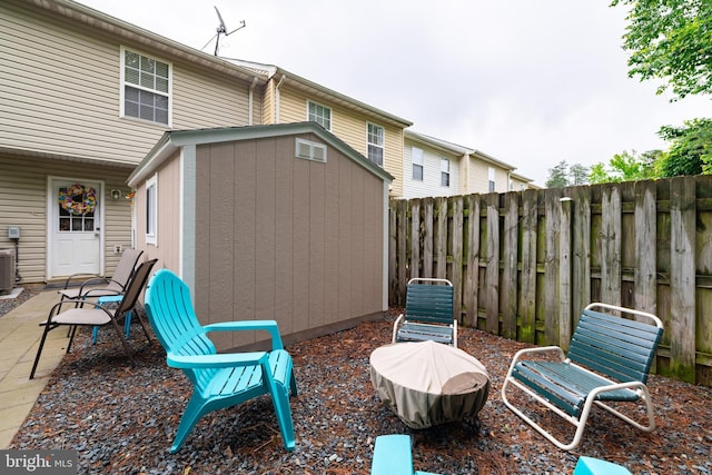 9910 Warwick Pl, Fredericksburg, VA 22408 - fenced backyard featuring central air condition unit and a patio area