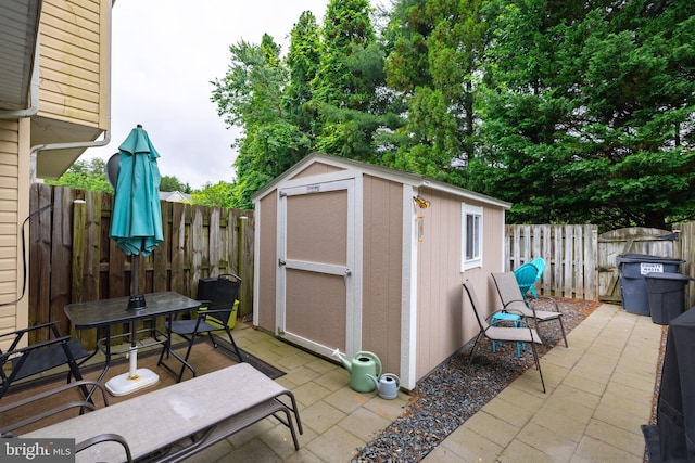 9910 Warwick Pl, Fredericksburg, VA 22408 - fenced backyard featuring a patio and outdoor dining space