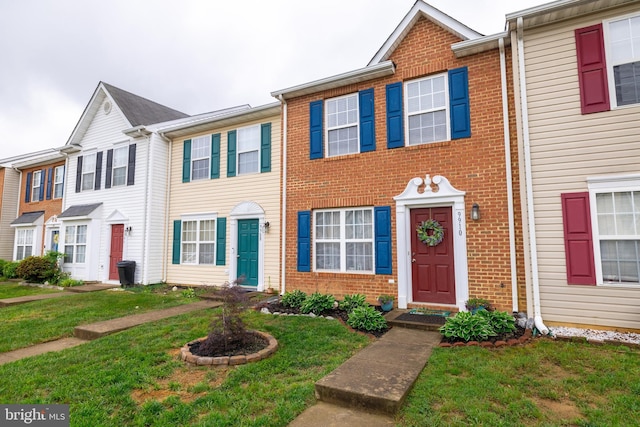 9910 Warwick Pl, Fredericksburg, VA 22408 - multi unit property with brick siding and a front yard