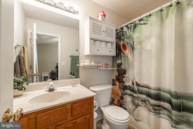 9910 Warwick Pl, Fredericksburg, VA 22408 - bathroom with vanity, toilet, a textured ceiling, and a shower with curtain