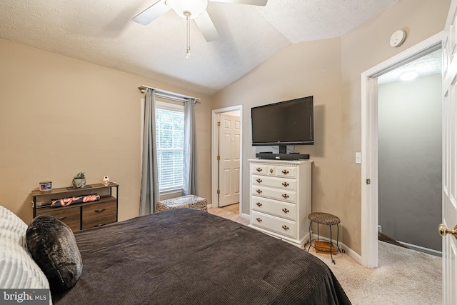 9910 Warwick Pl, Fredericksburg, VA 22408 - bedroom with lofted ceiling, light colored carpet, baseboards, ceiling fan, and a textured ceiling