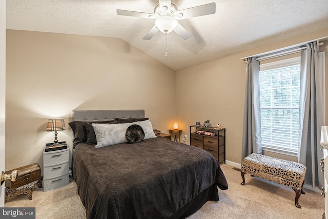 9910 Warwick Pl, Fredericksburg, VA 22408 - bedroom with light colored carpet, lofted ceiling, a ceiling fan, and a textured ceiling