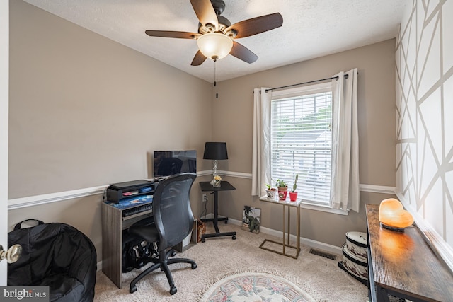9910 Warwick Pl, Fredericksburg, VA 22408 - home office with healthy amount of natural light, ceiling fan, baseboards, and carpet