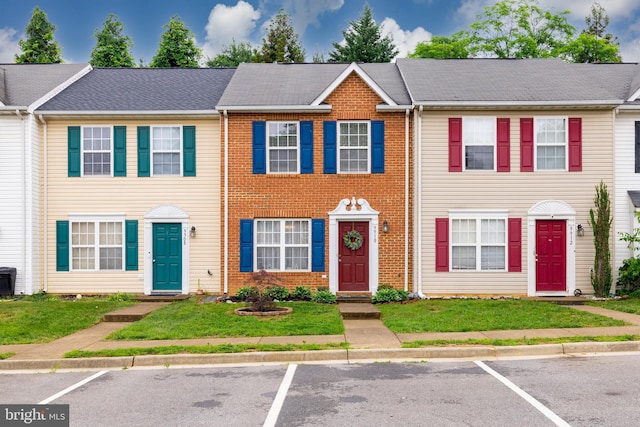 9910 Warwick Pl, Fredericksburg, VA 22408 - multi unit property featuring uncovered parking and a front yard