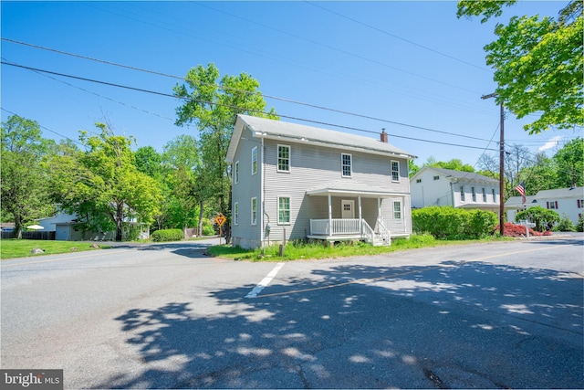 571 Main St, Pattenburg, Asbury, NJ 08802 - view of front facade featuring a porch and uncovered parking