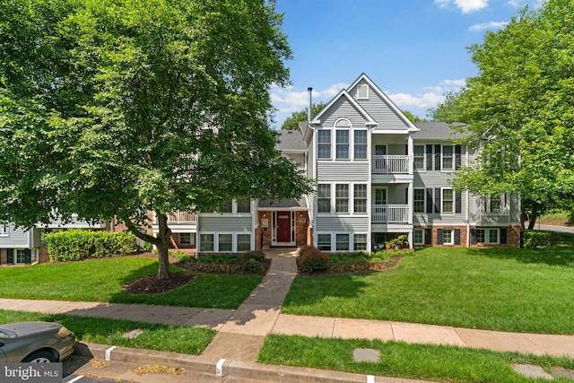 1476 Greenbriar Cir Unit 1-1476, Pikesville, MD 21208 - multi unit property with a front yard and brick siding