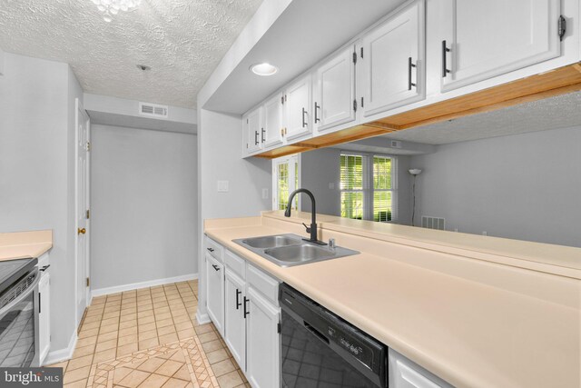 1476 Greenbriar Cir Unit 1-1476, Pikesville, MD 21208 - kitchen featuring black dishwasher, a sink, white cabinets, a textured ceiling, and electric range