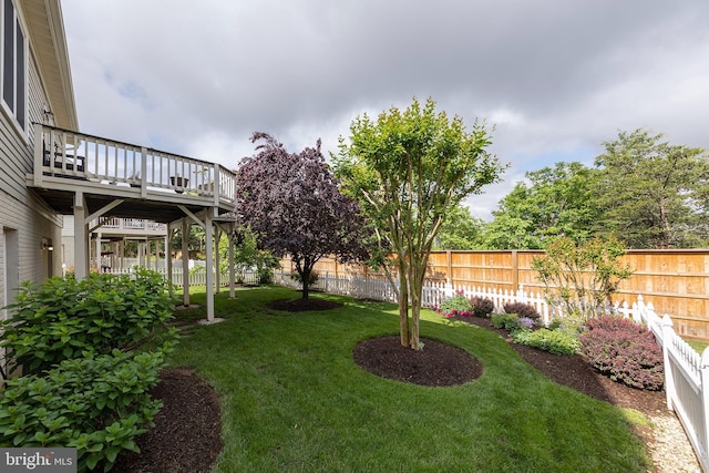 view of yard with a deck