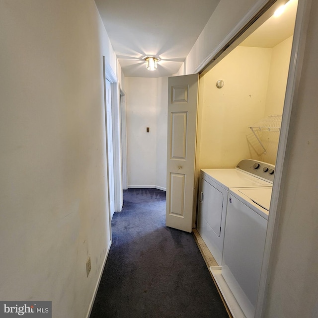 laundry room featuring washer and dryer and carpet floors