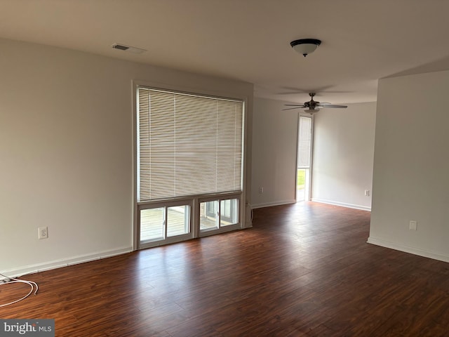 7308 Donnell Pl Unit B-1, District Heights, MD 20747 - spare room featuring dark wood-style floors, ceiling fan, and baseboards