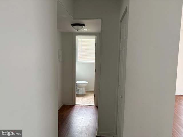 7308 Donnell Pl Unit B-1, District Heights, MD 20747 - corridor with baseboards and wood finished floors